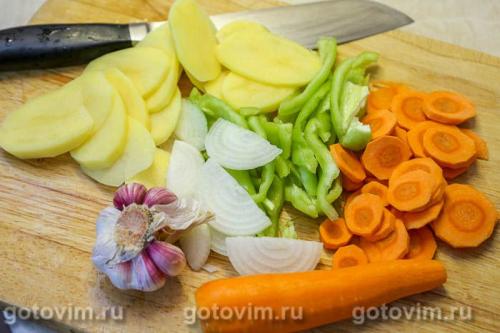 Утиные желудки с овощами, запеченные  в рукаве